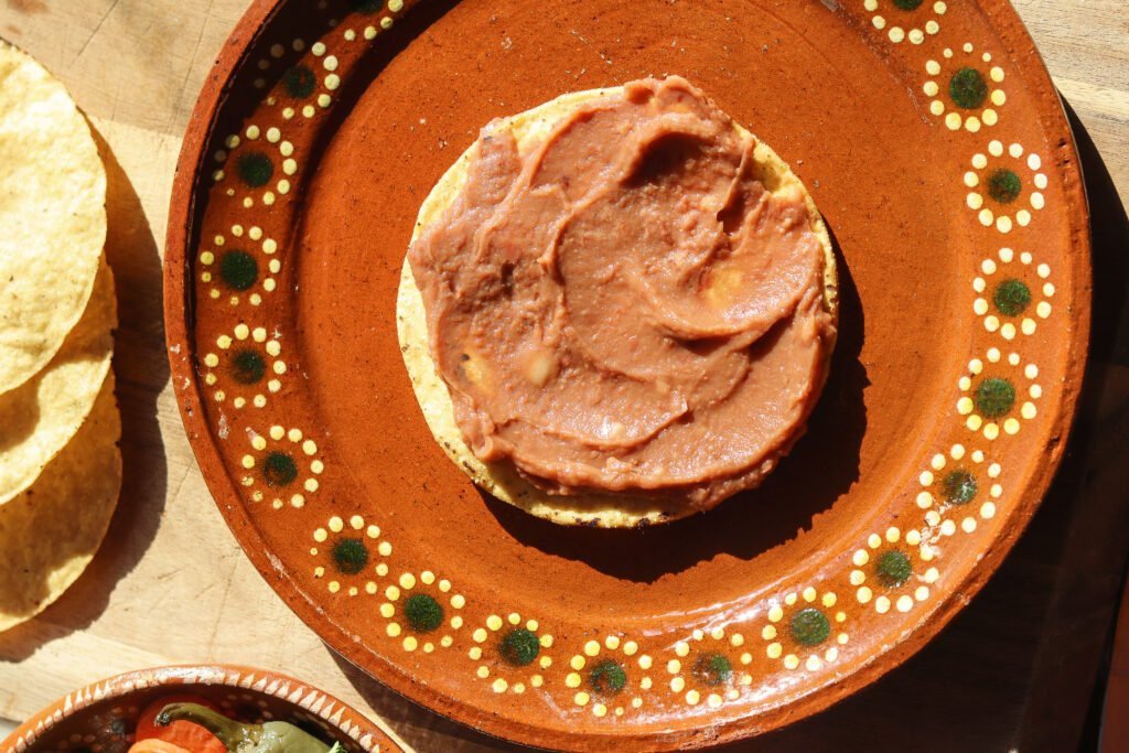 Bean tostada assembly