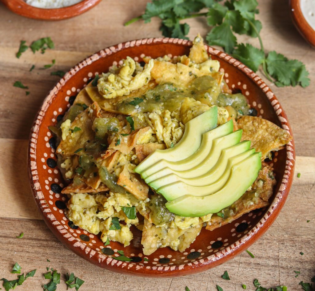 vegan chilaquiles in a Mexican plate.