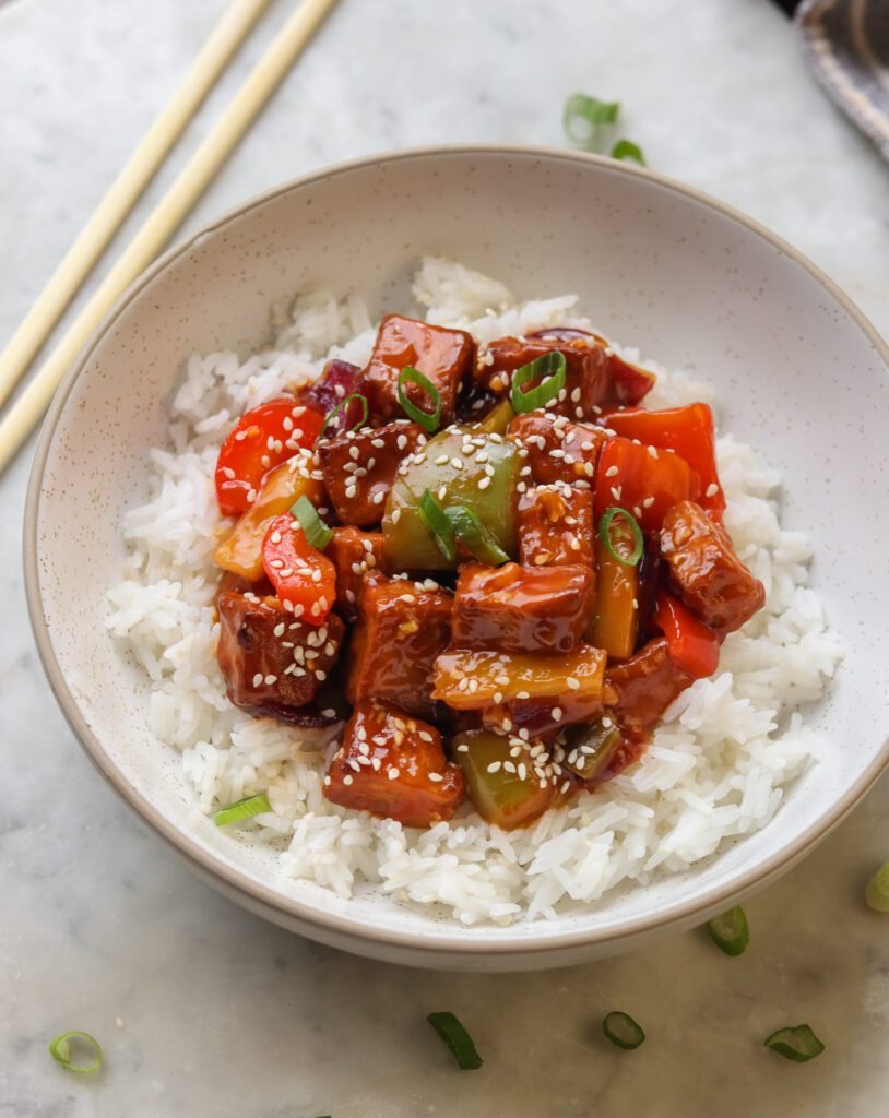 the best chinese sweet and sour tofu in a bowl. 