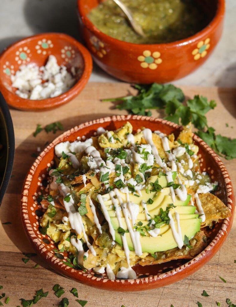 vegan chilaquiles in a Mexican plate.