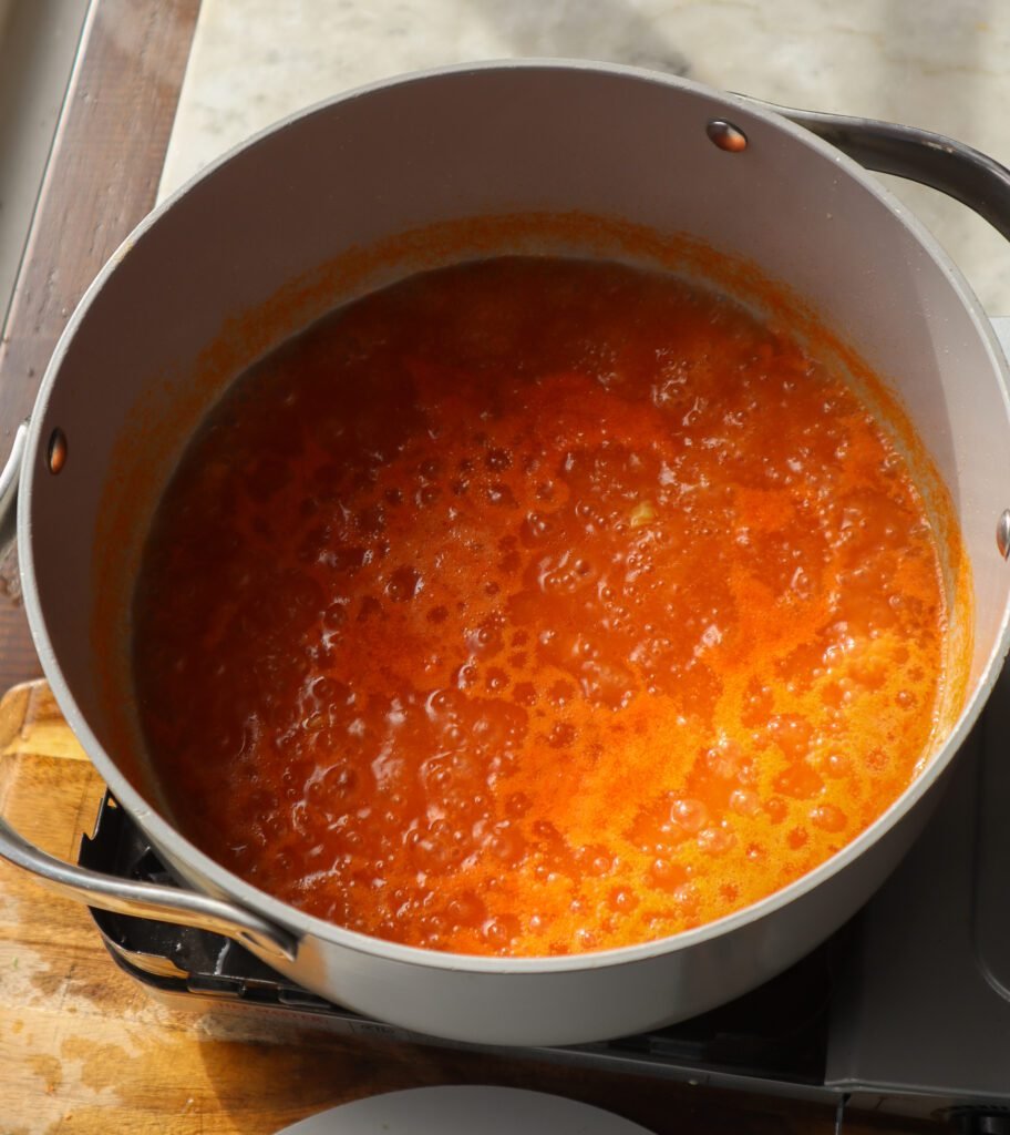 broth simmering in a pot.