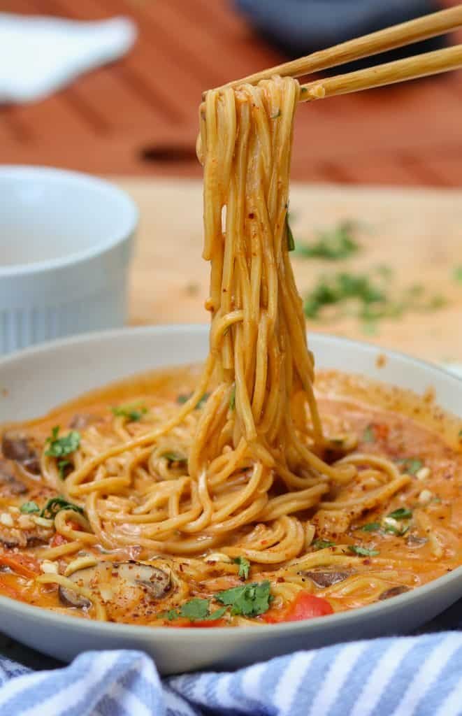 peanut butter ramen noodles in a white bowl.