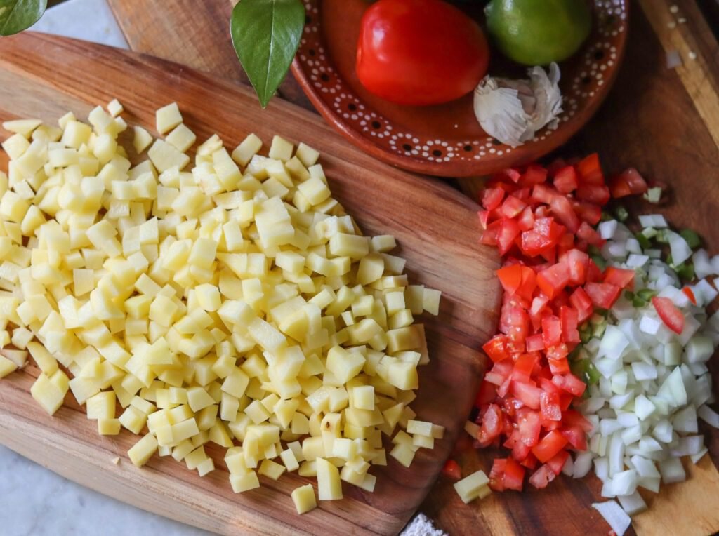 mexican potatoes recipe on a cutting board.