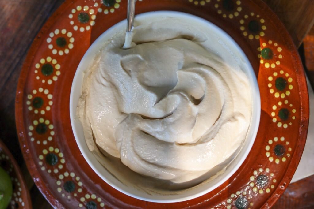 vegan cheese made with tofu, cashews, and spices in a bowl.