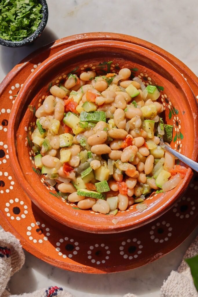 mexican zucchini recipe with beans in a bowl.