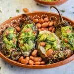 stuffed jalapenos in a mexican plate.