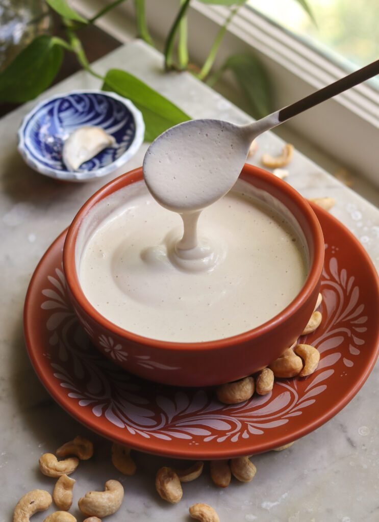 vegan sour cream in a mexican bowl - mexican crema style.