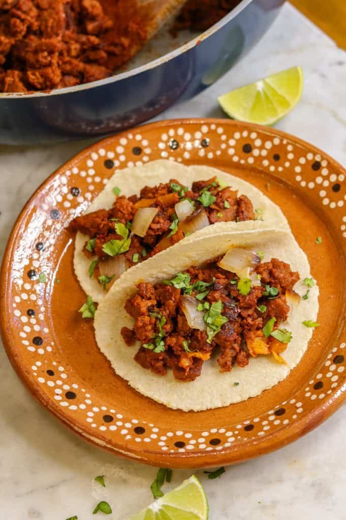 vegan al pastor tacos on a plate.