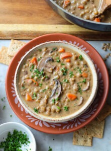 creamy lentil soup in a bowl.