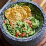 guacamole in a molcajete.