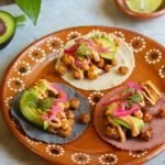 veggie cauliflower tacos on a mexican plate.