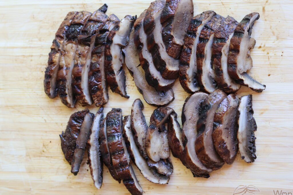 mushroom tacos recipe sliced on a cutting board.