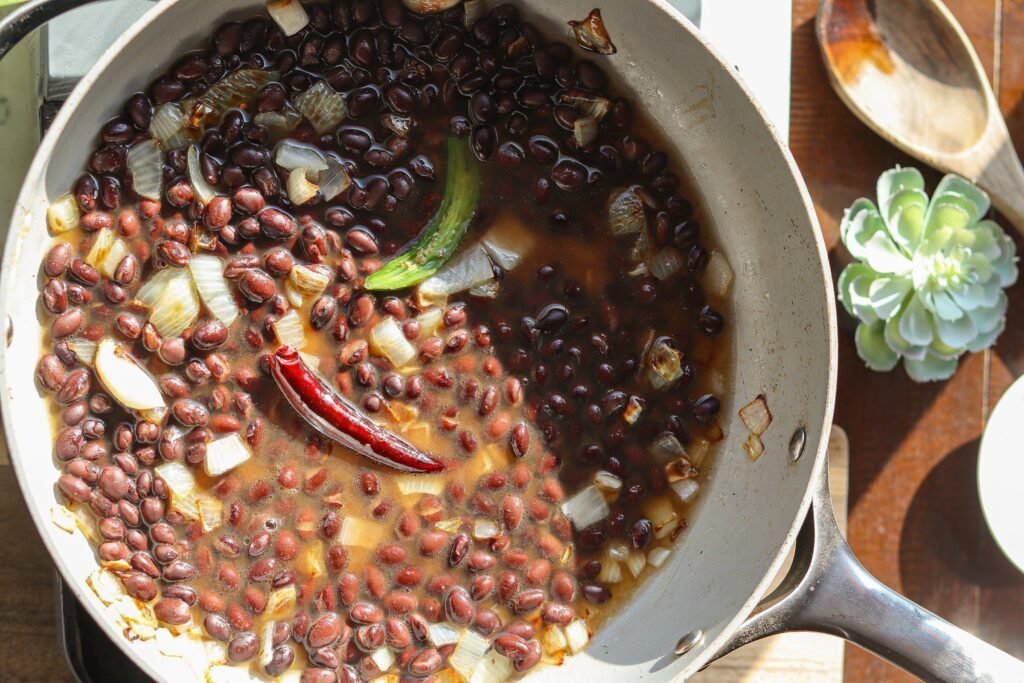 enfrijoladas recipe mexicanas in a pan.