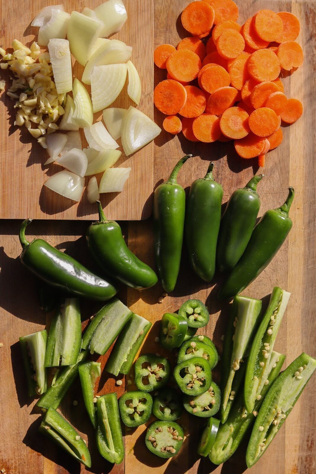 chopping veggies for escabeche recipe.