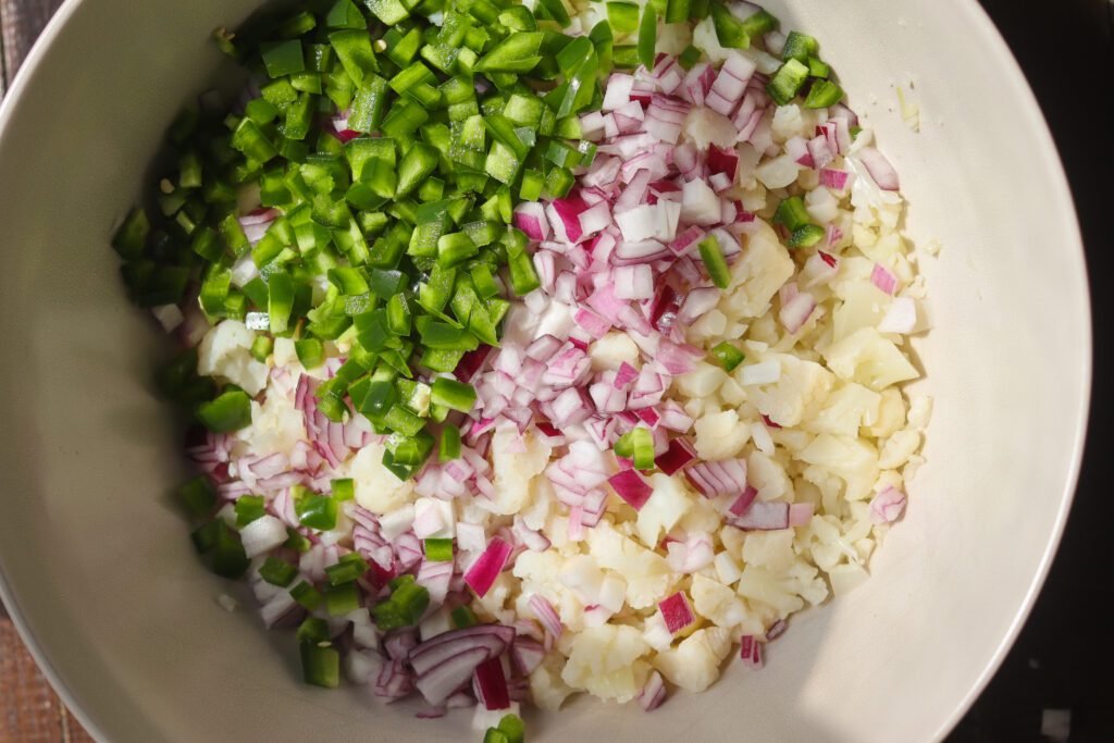chopped veggies in a mixing bowl.