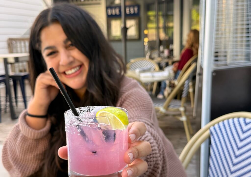 ME holding a drink at Due West.